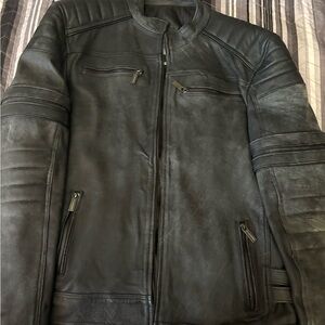 Used Men's Black Leather Jacket wash off effect .